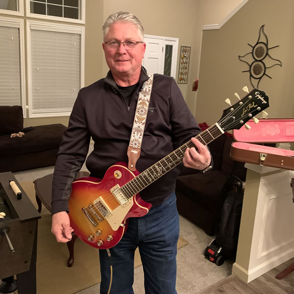 David with one of his guitars